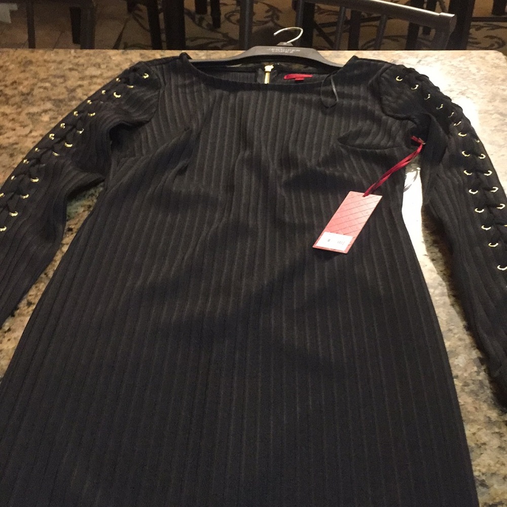 Jennifer Lopez stretchy black dress size 8